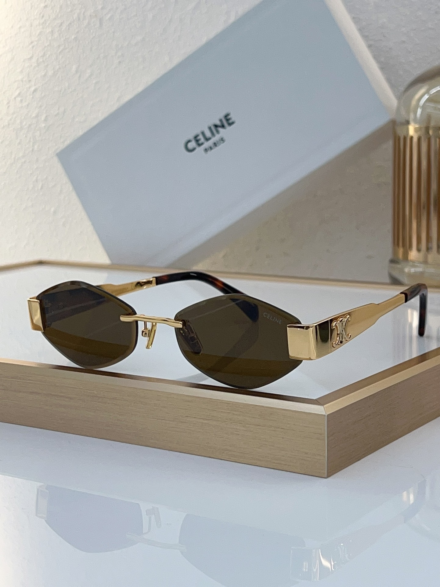 Celine Narrow Oval Metal Sunglasses with Gold Triomphe Accents (Model: CL4093)