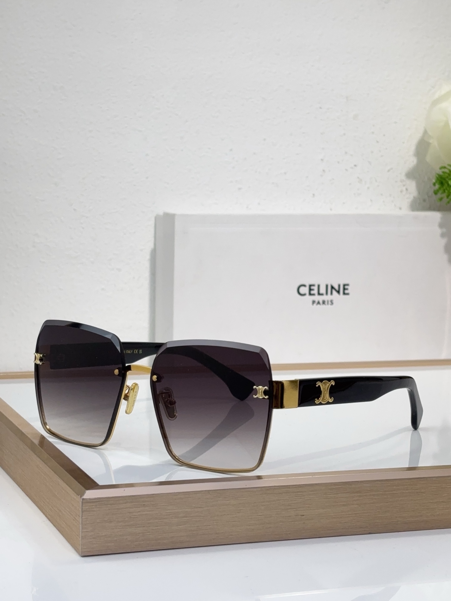 Celine Square Semi - Rimless Sunglasses with Gold Triomphe Accents (Model: CL4050)