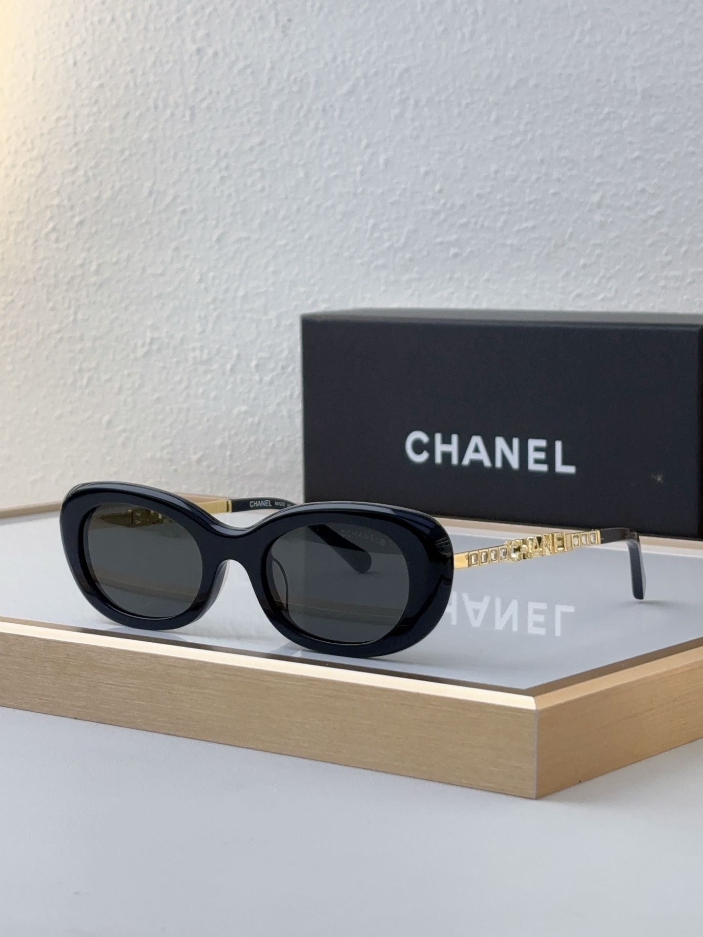 Chanel Oval Sunglasses with Glitter - Infused Gray Acetate & Black CHANEL Temples (Model: CH5520)
