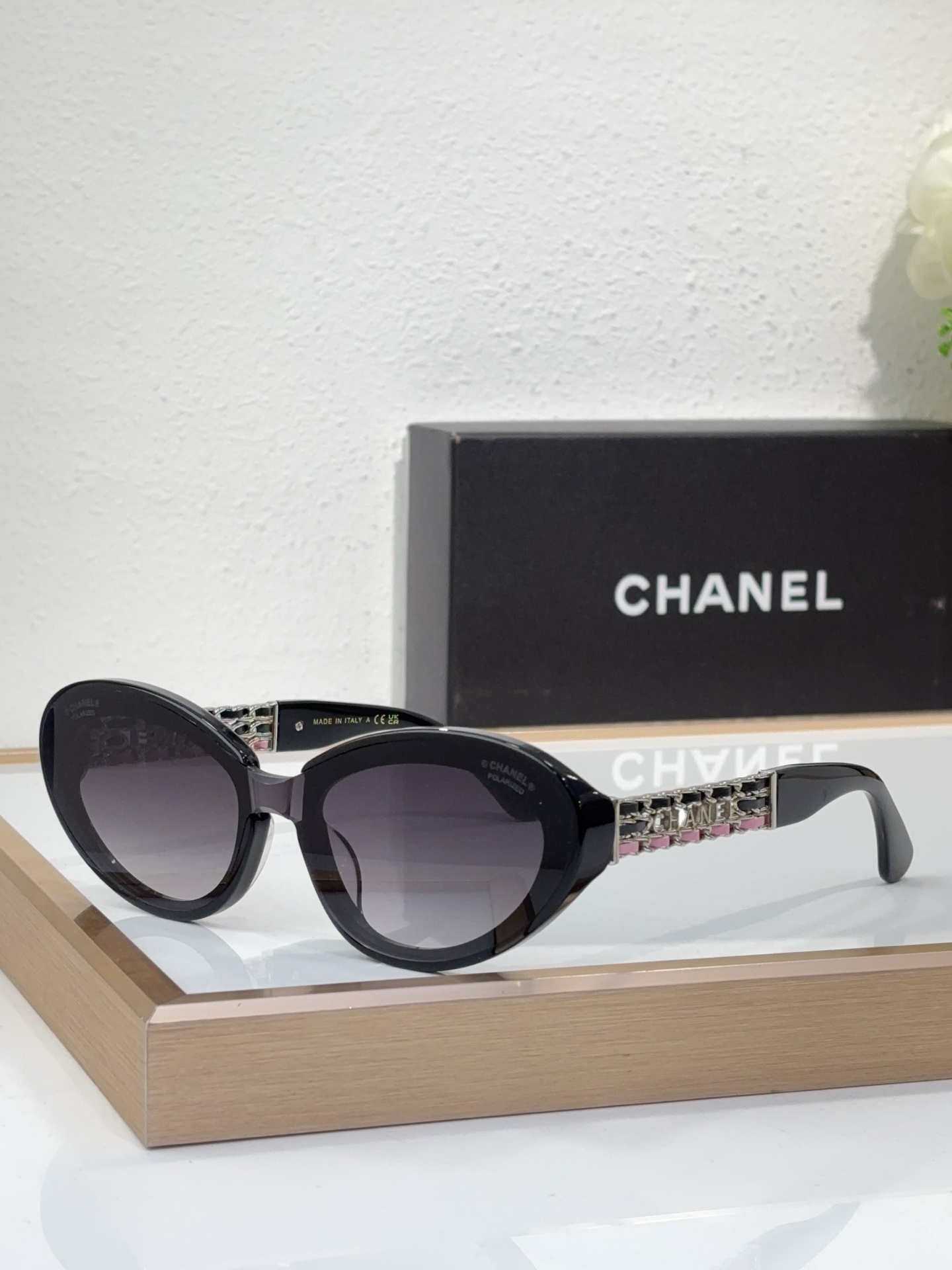Chanel Black Acetate Oval Sunglasses with Crystal - Embellished & Brand - Inlaid Temples (Model: CH5639)