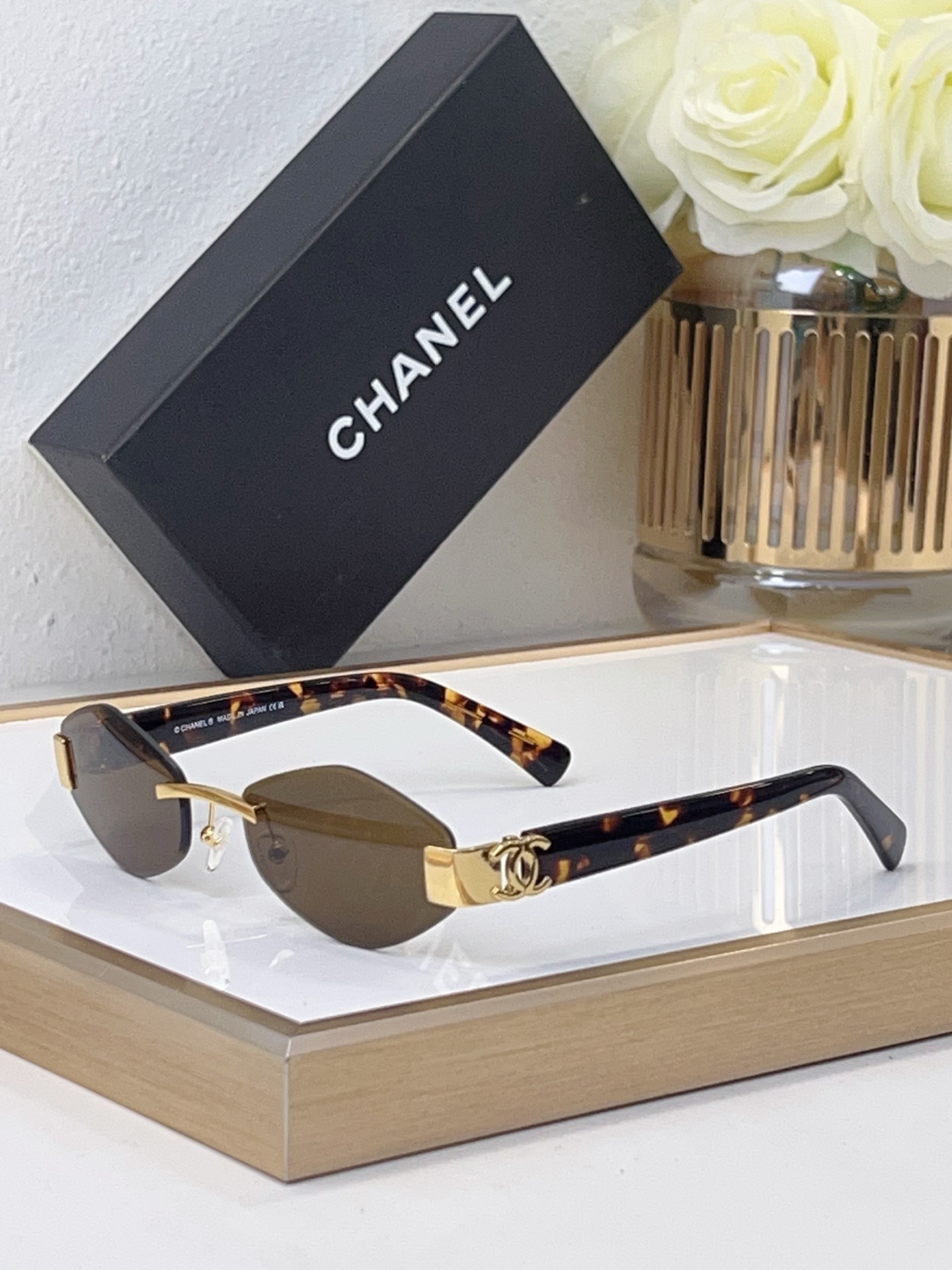 Chanel Oval Semi - Rimless Sunglasses with Gold - Tone CC & Tortoiseshell Temples (Model: CH5599)