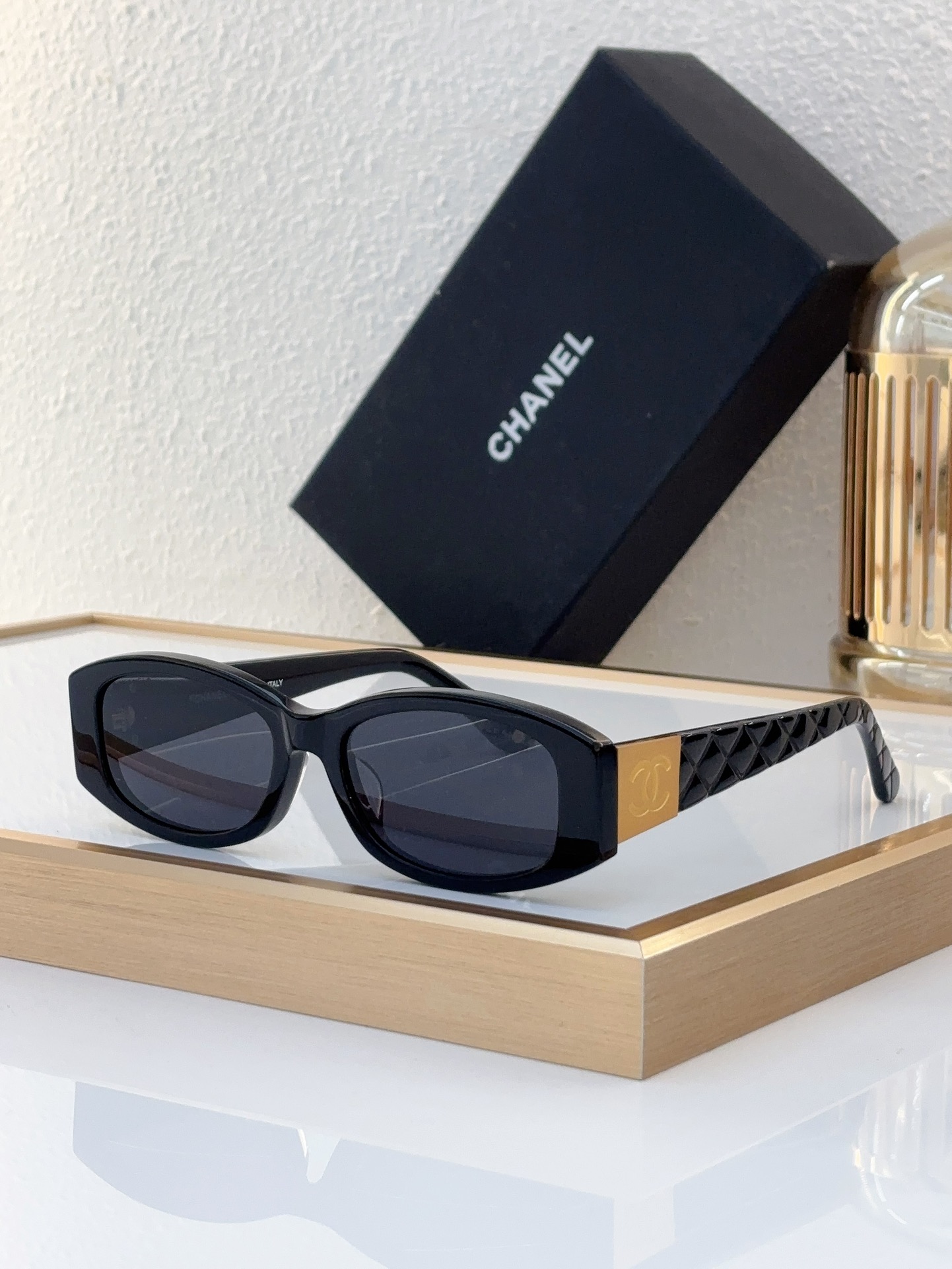 Chanel Black Acetate Oval Sunglasses with Gold - Tone CC & Quilted Motif (Model: CH5590)
