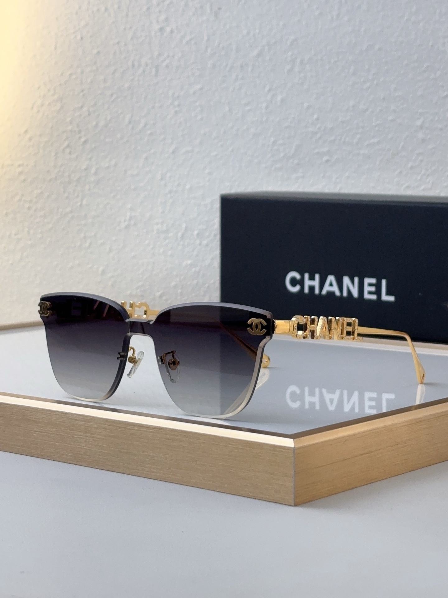 Chanel Gold - Tone Metal Semi - Rimless Square Sunglasses with "CHANEL" & CC Motif (Model: CH5583)