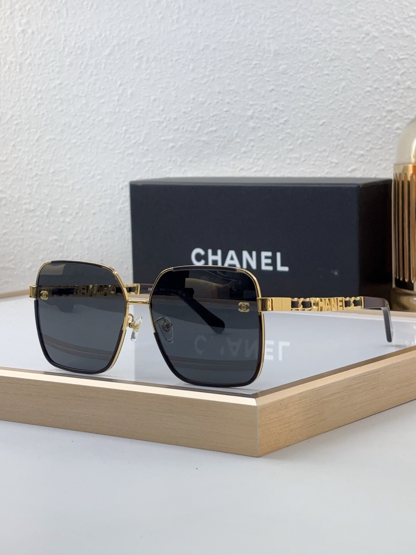 Chanel Gold - Tone Metal Square Sunglasses with Cut - Out "CHANEL" & CC Motif (Model: CH5564)