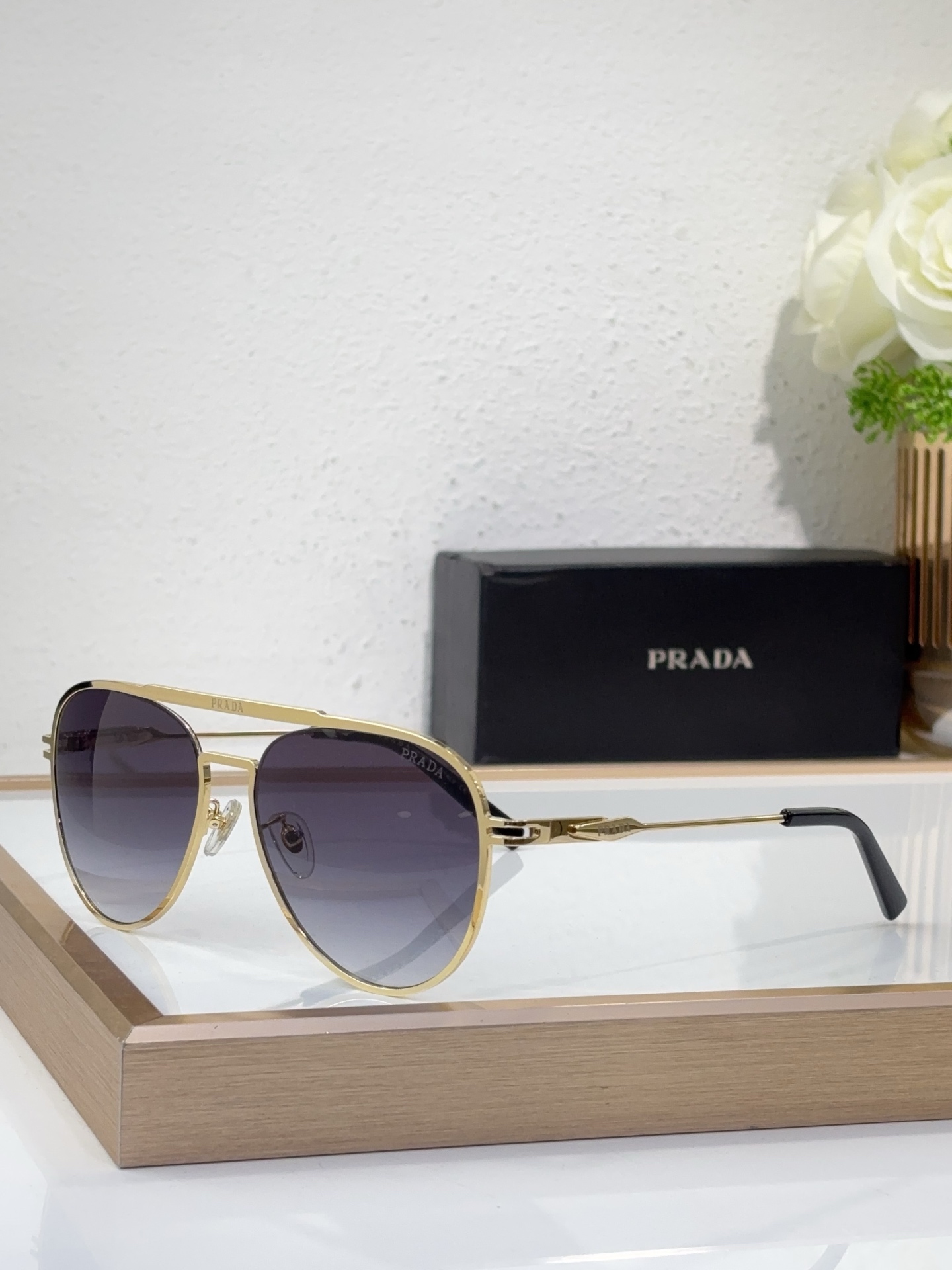 Prada Gold - Tone Metal Aviator Sunglasses with Gradient Lenses (Model: PR14014S)