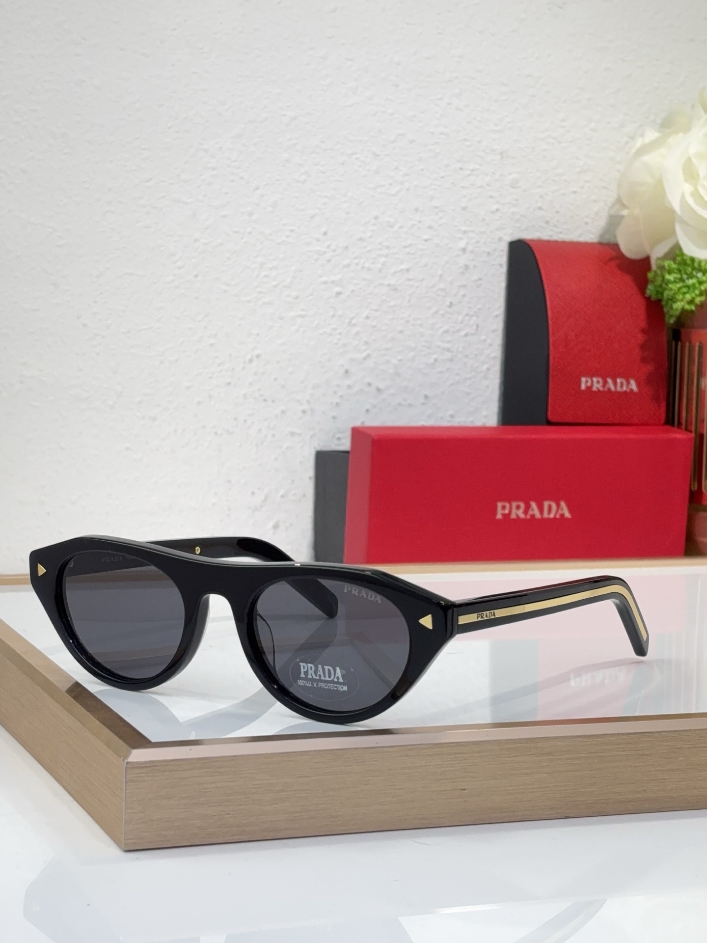 Prada Black Acetate Cat - Eye Sunglasses with Gold Accents (Model: PR11892S)