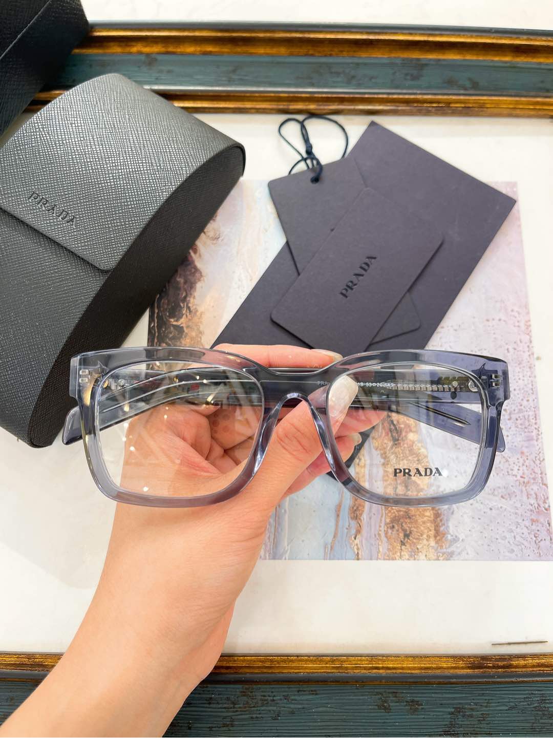 Prada Transparent Gray Acetate Square Optical Glasses (Model: PR7569O)