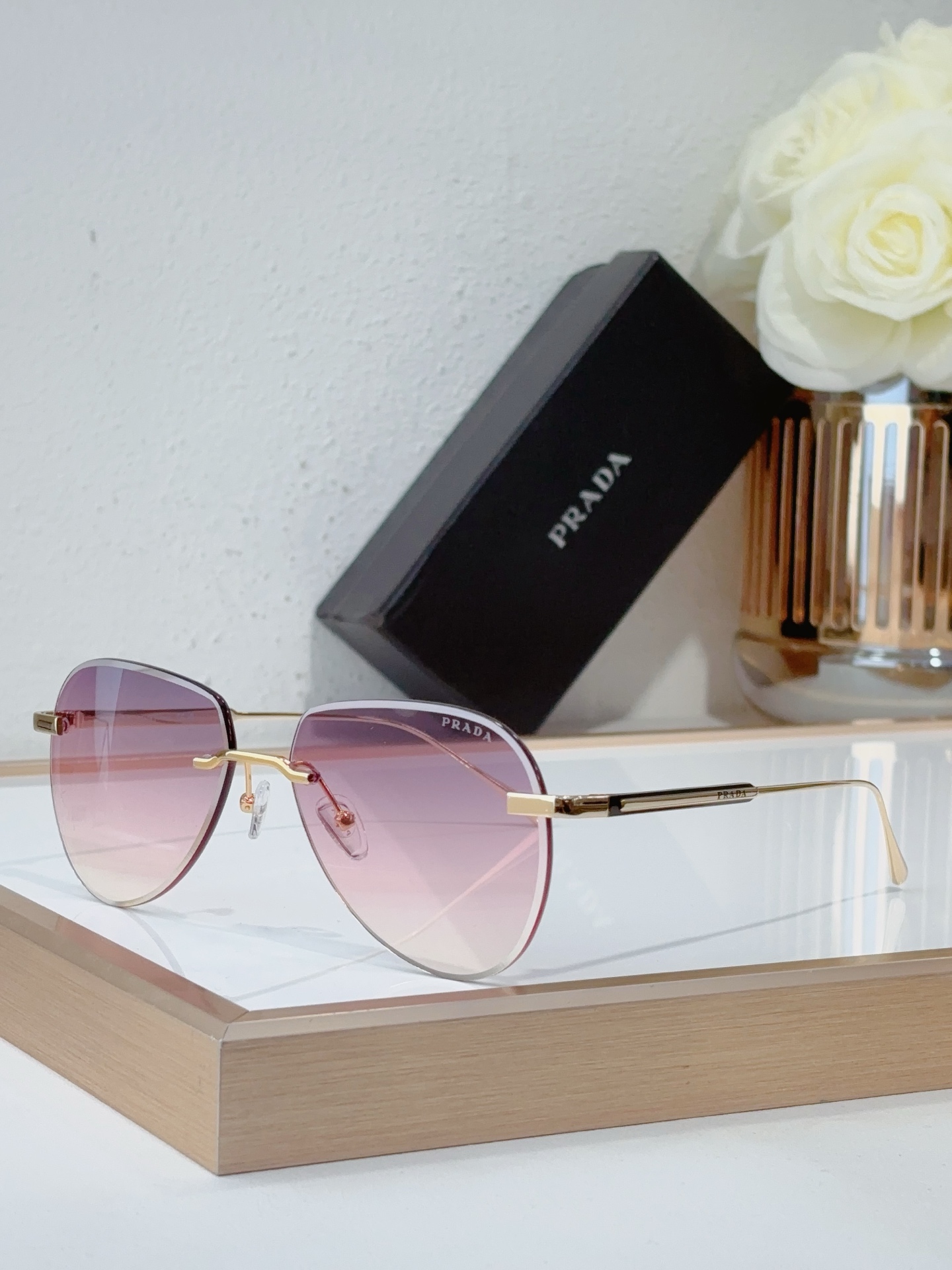 Prada Gold - Tone Metal Rimless Aviator Sunglasses with Pink - Gradient Lenses (Model: PR6458S)