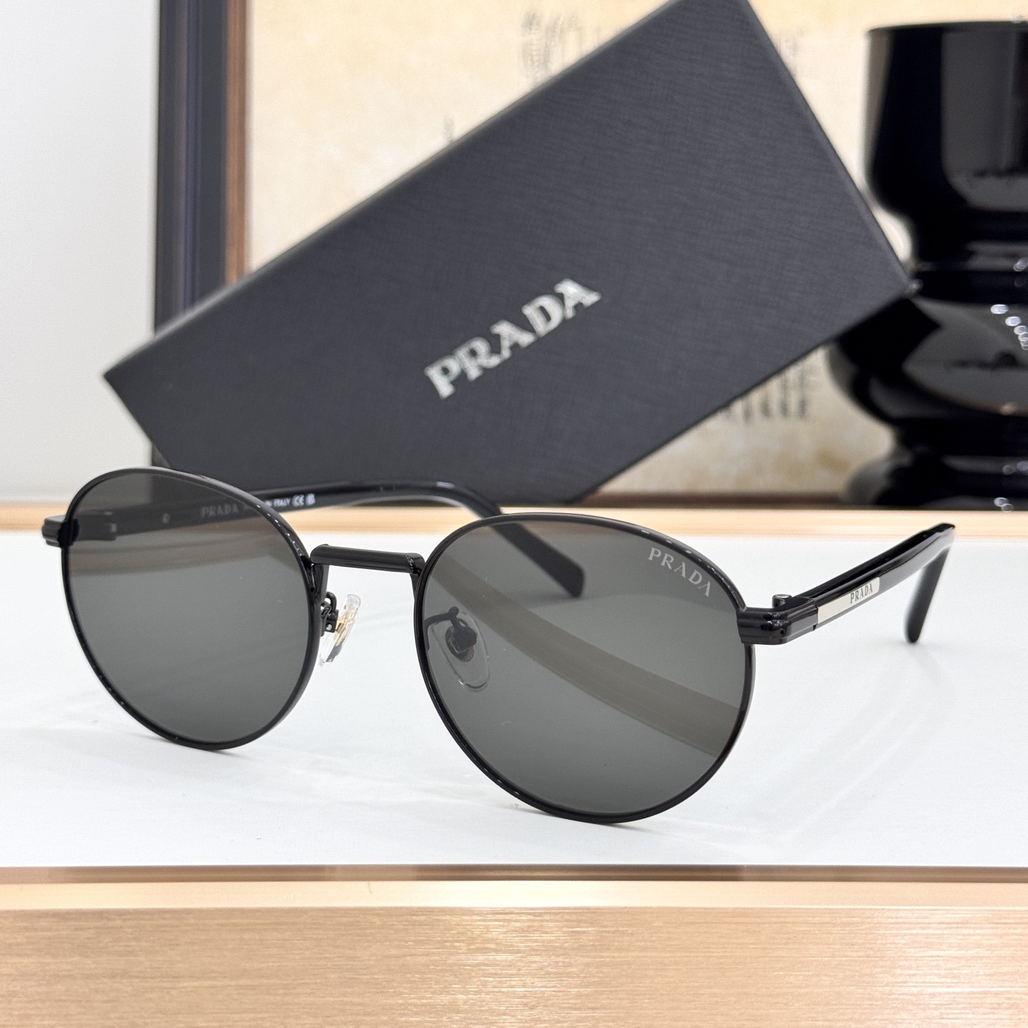 Prada Black Metal Round Sunglasses (Model: PR1234S)