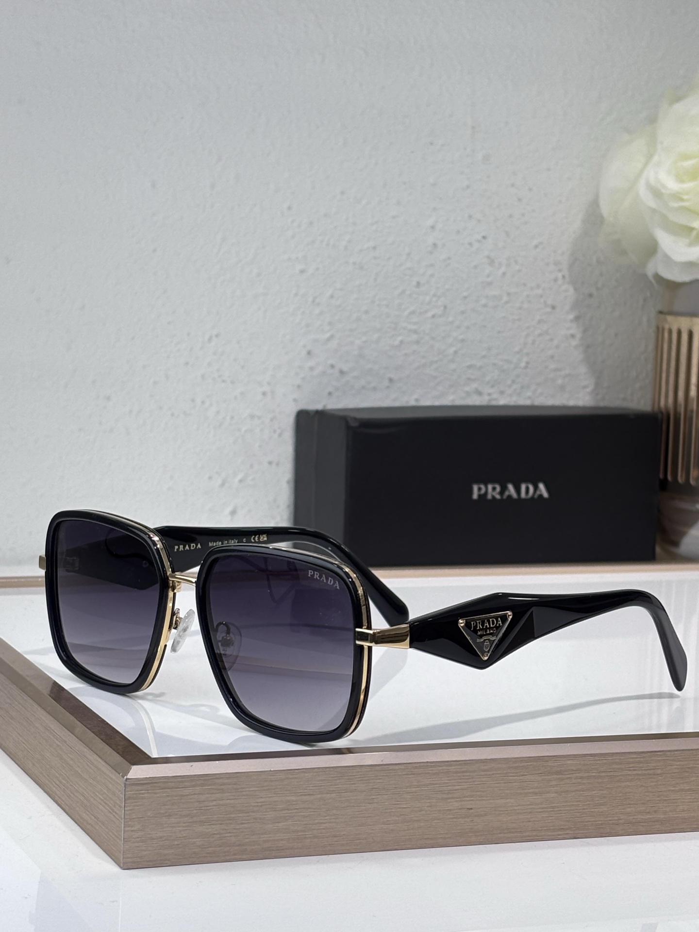 Prada Square Sunglasses with Gold Accents & Triangle Logo (Model: PR7777S)