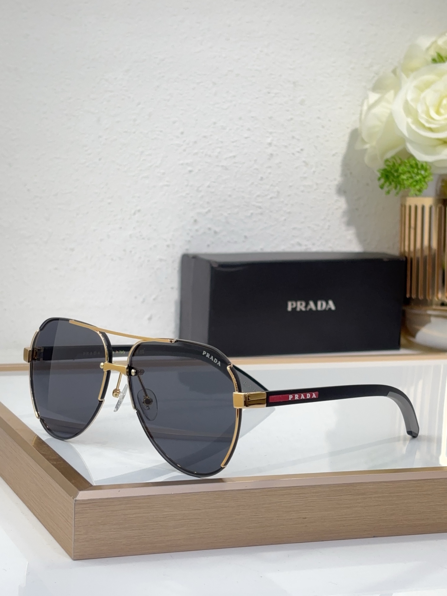 Prada Gold - Metal Aviator Sunglasses with Red - Black Temple Detailing (Model: PR9999S)