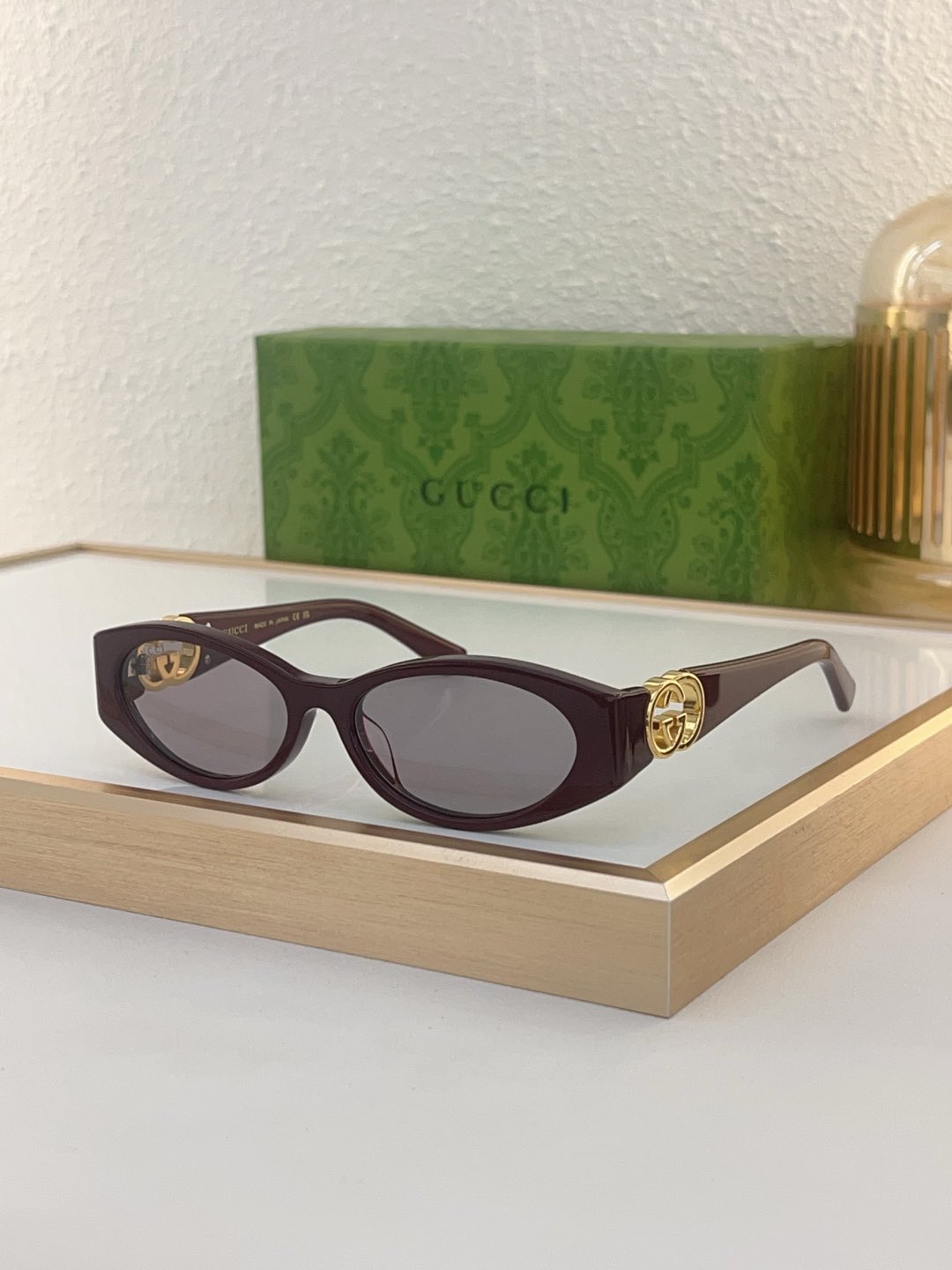 Gucci Oval Burgundy Acetate Sunglasses with Gold - Tone Double G Accents (Model: GG3700S)