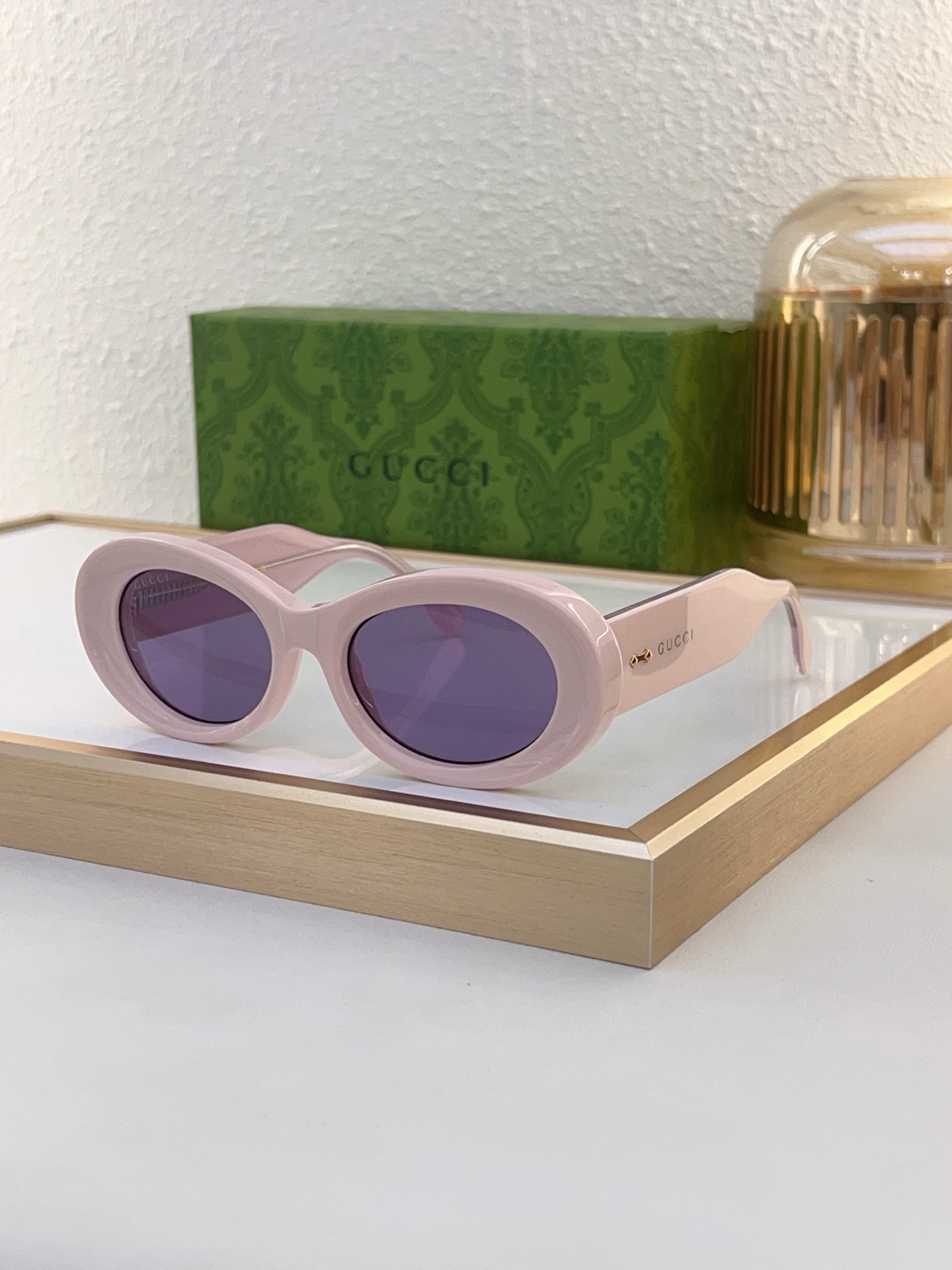 Gucci Oval - Frame Sunglasses in Pink Acetate with Gold - Tone Logo Detailing