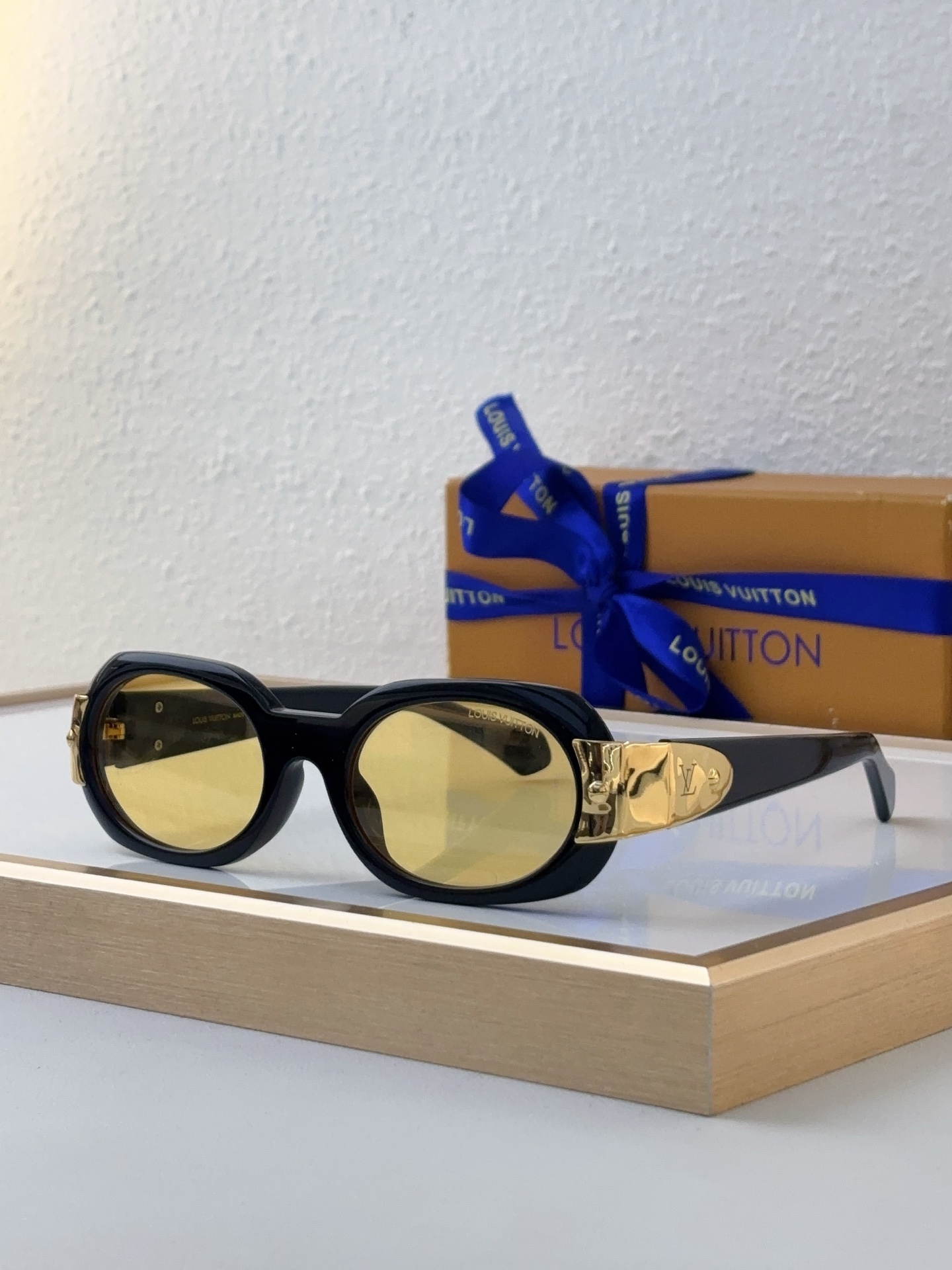 Louis Vuitton Oval Acetate Sunglasses with Gold - Tone Metal Accents, White Frame & Brown Lenses - Z1799E