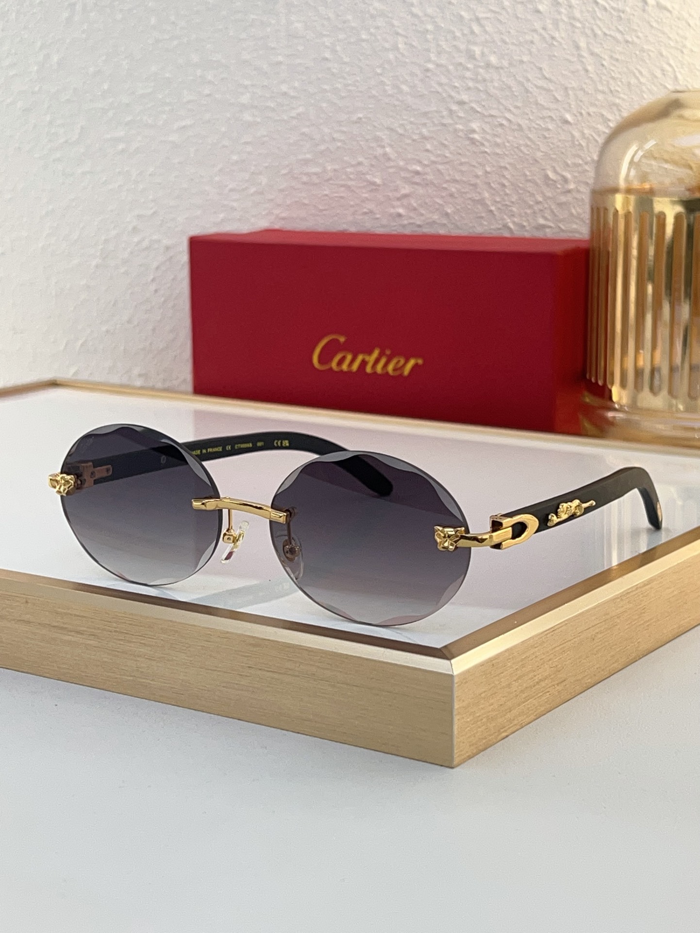 Cartier CT0064S Rimless Oval Sunglasses