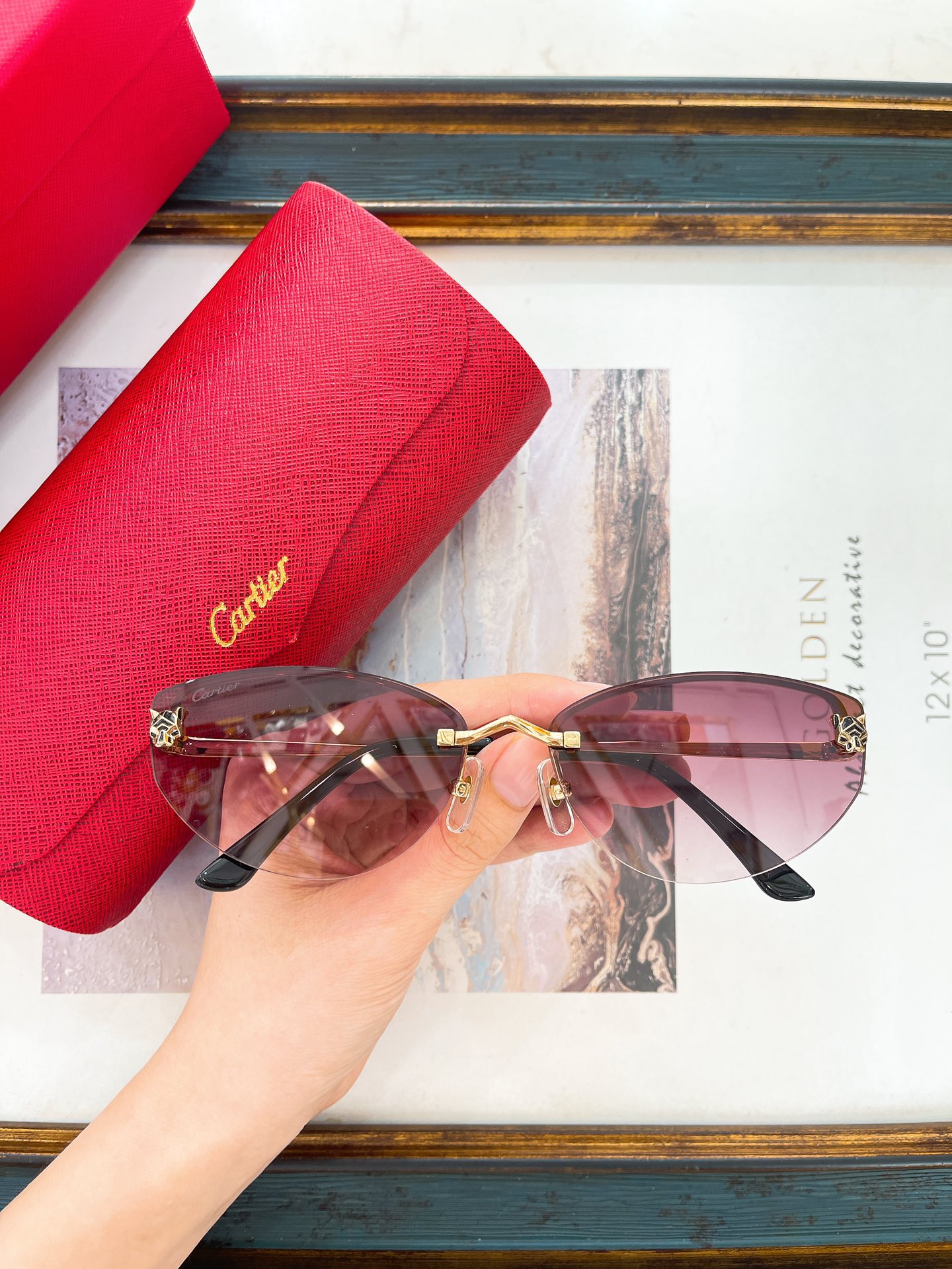 Cartier CT0431S Panther Head Oval Rimless Sunglasses