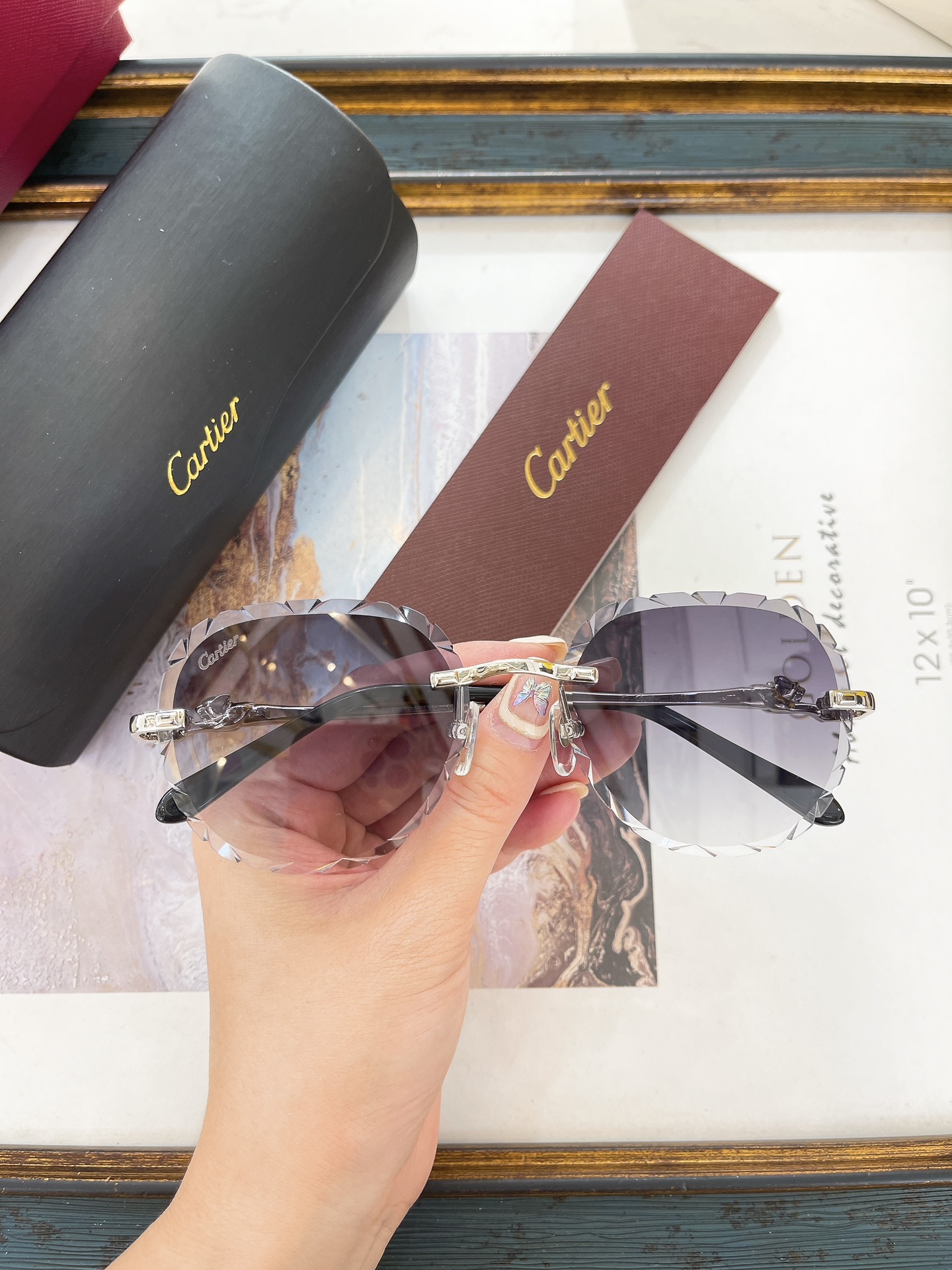 Cartier CT0281O Butterfly-Cut Rimless Sunglasses