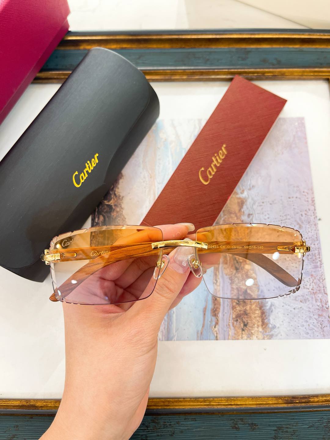 Cartier CT0243S Rimless Sunglasses