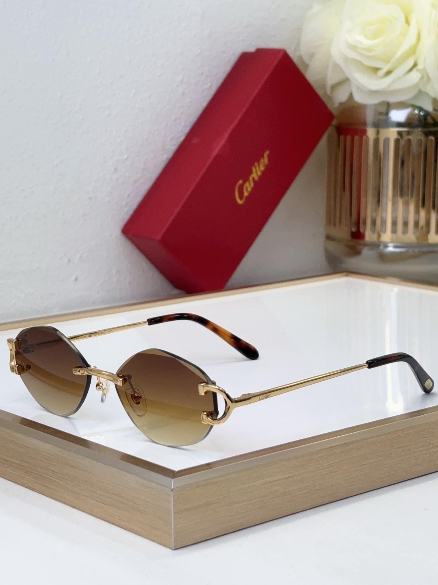 Cartier CT0092 Round Rimless Sunglasses