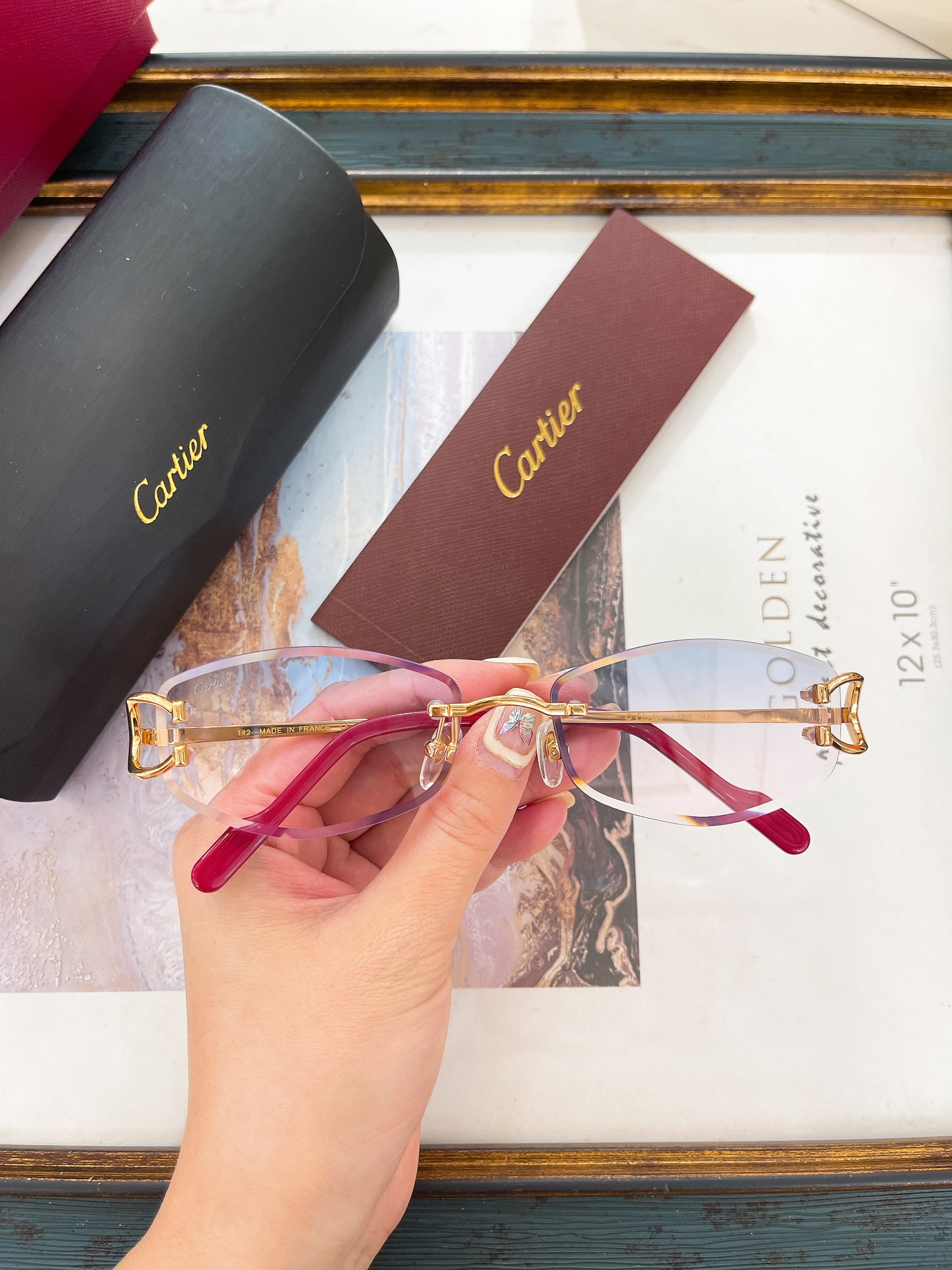 Cartier CT0596 Oval Rimless Sunglasses with Gold C Décor