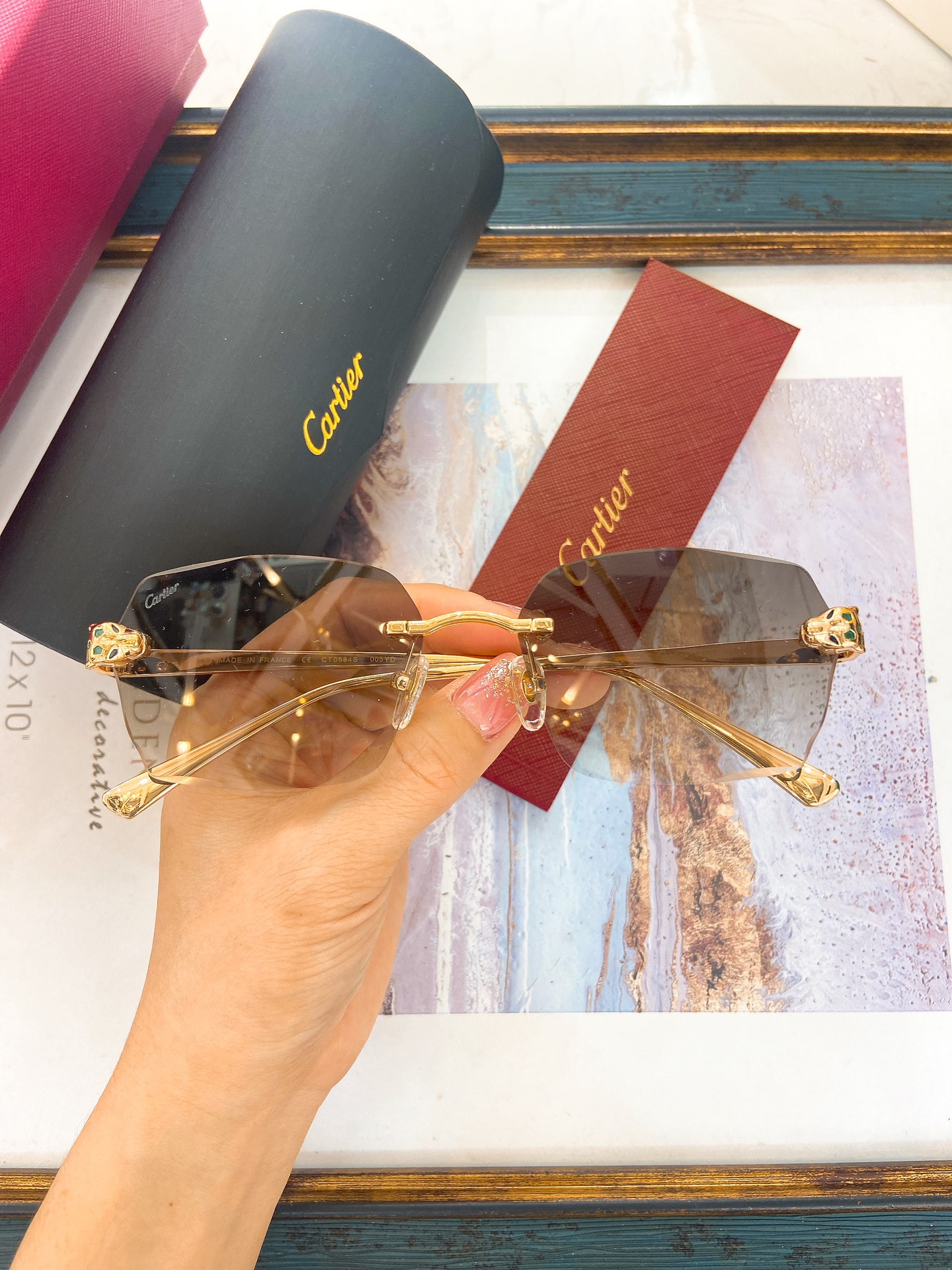 Cartier CT0584S Rimless Gold-Frame Sunglasses