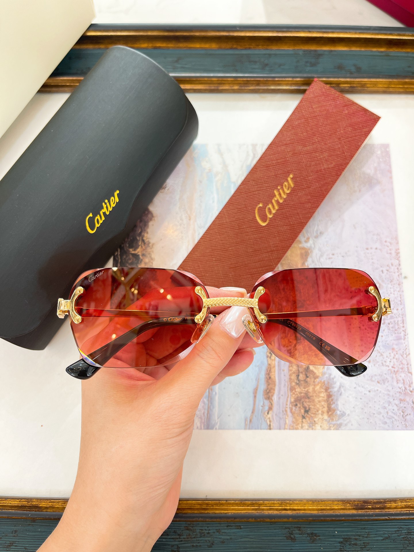 Cartier CT0552S Filigree‑Bridge Rimless Sunglasses