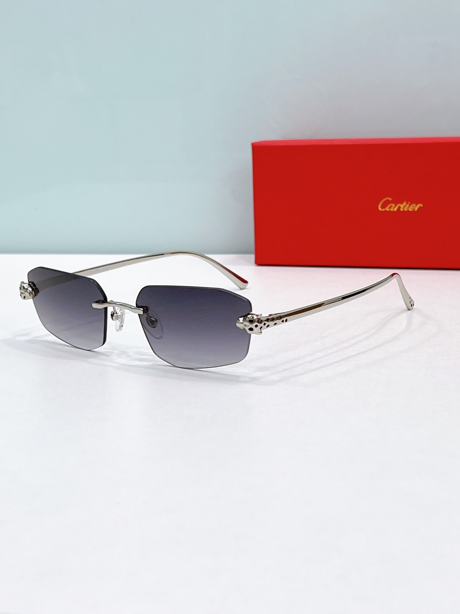 Cartier CT0474S Panther‑Temple Rimless Rectangular Sunglasses