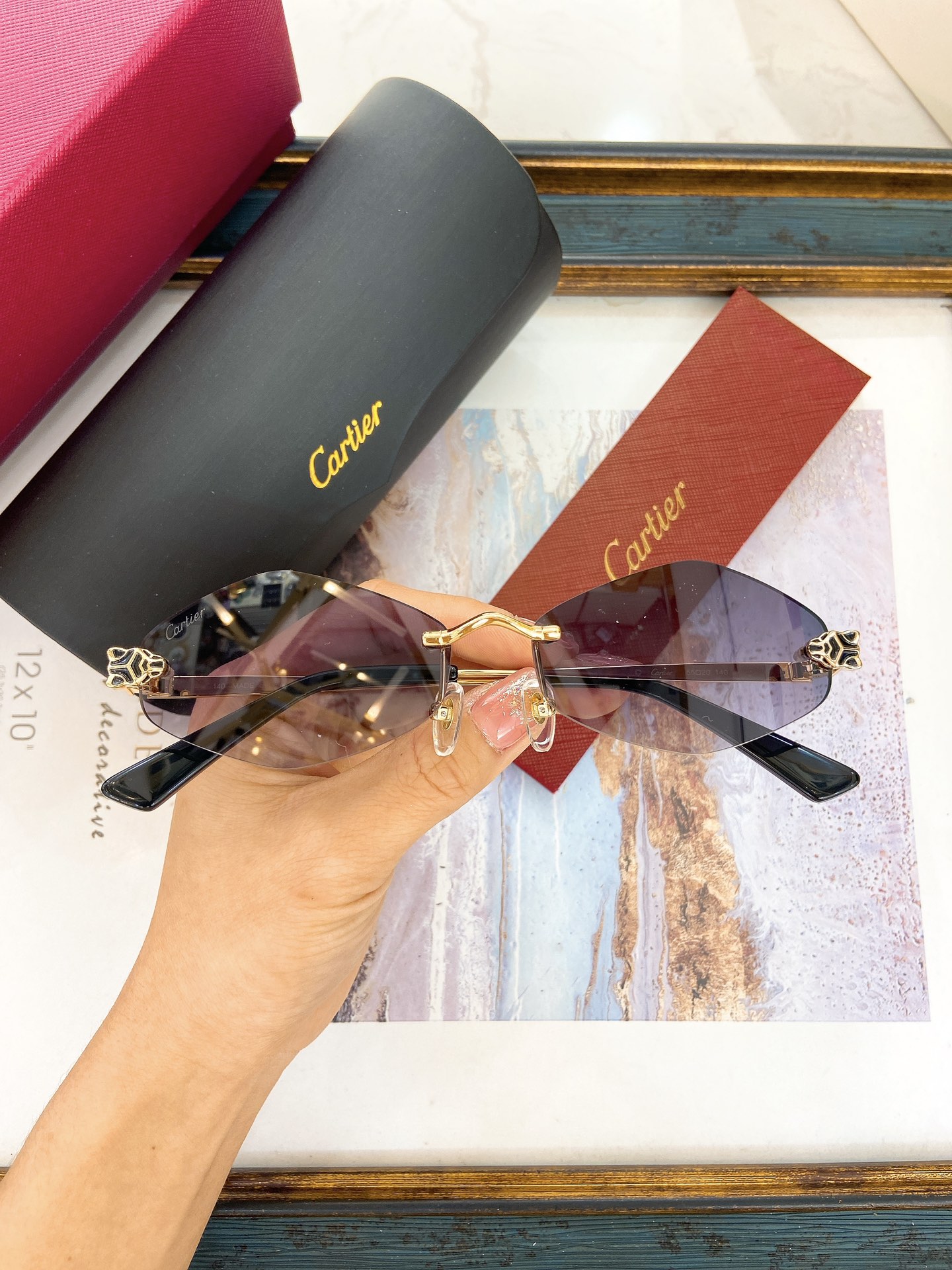 Cartier CT0433S Panther Motif Butterfly Rimless Sunglasses