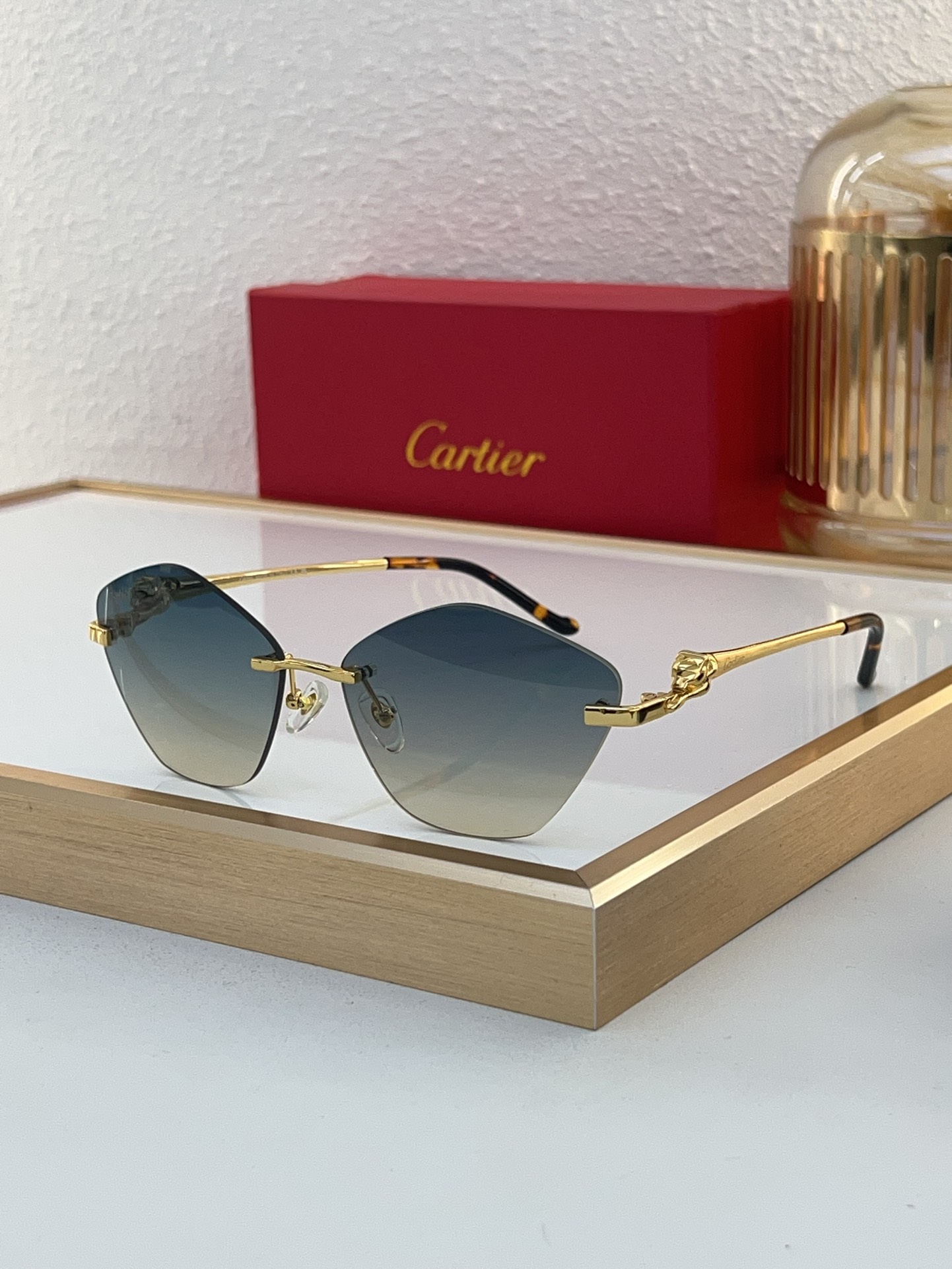 Cartier CT0429S Panther Head Rimless Gradient Sunglasses