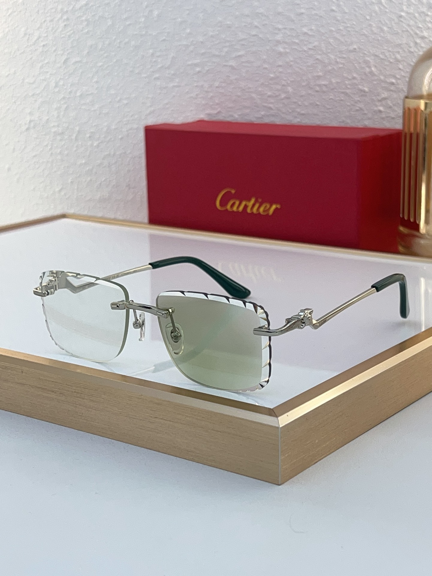 Cartier CT0120O Diamond‑Cut Temple Rimless Sunglasses