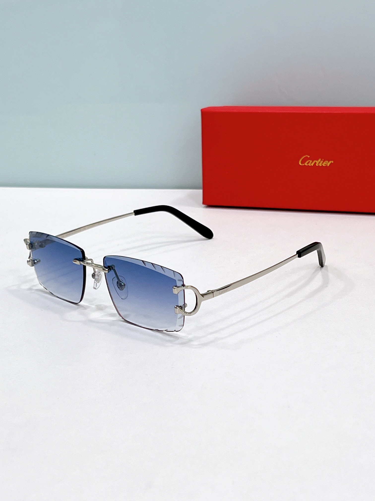 Cartier CT0094 Rimless Rectangular Sunglasses