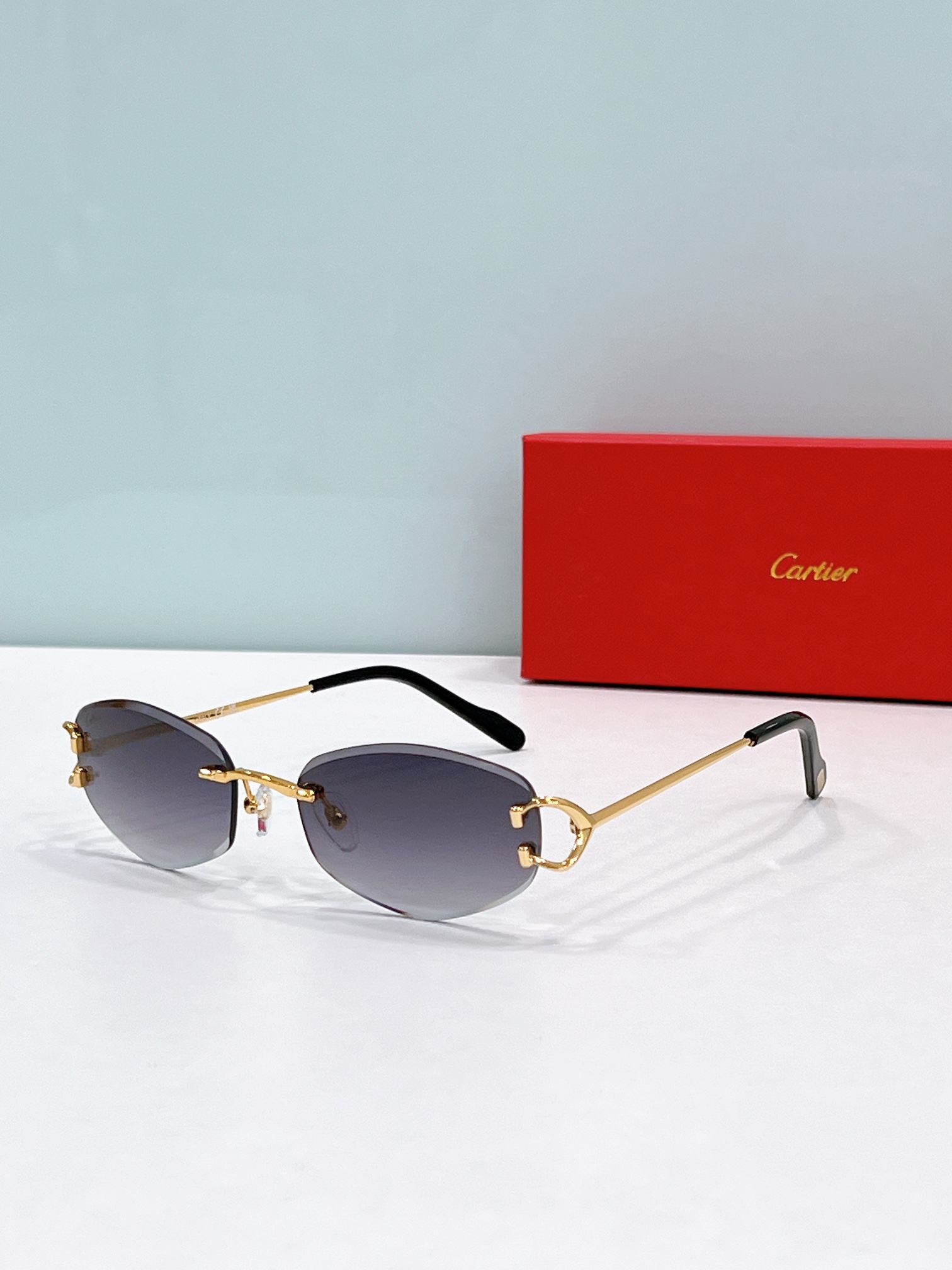 Cartier CT0467S Gold Rimless Square Sunglasses