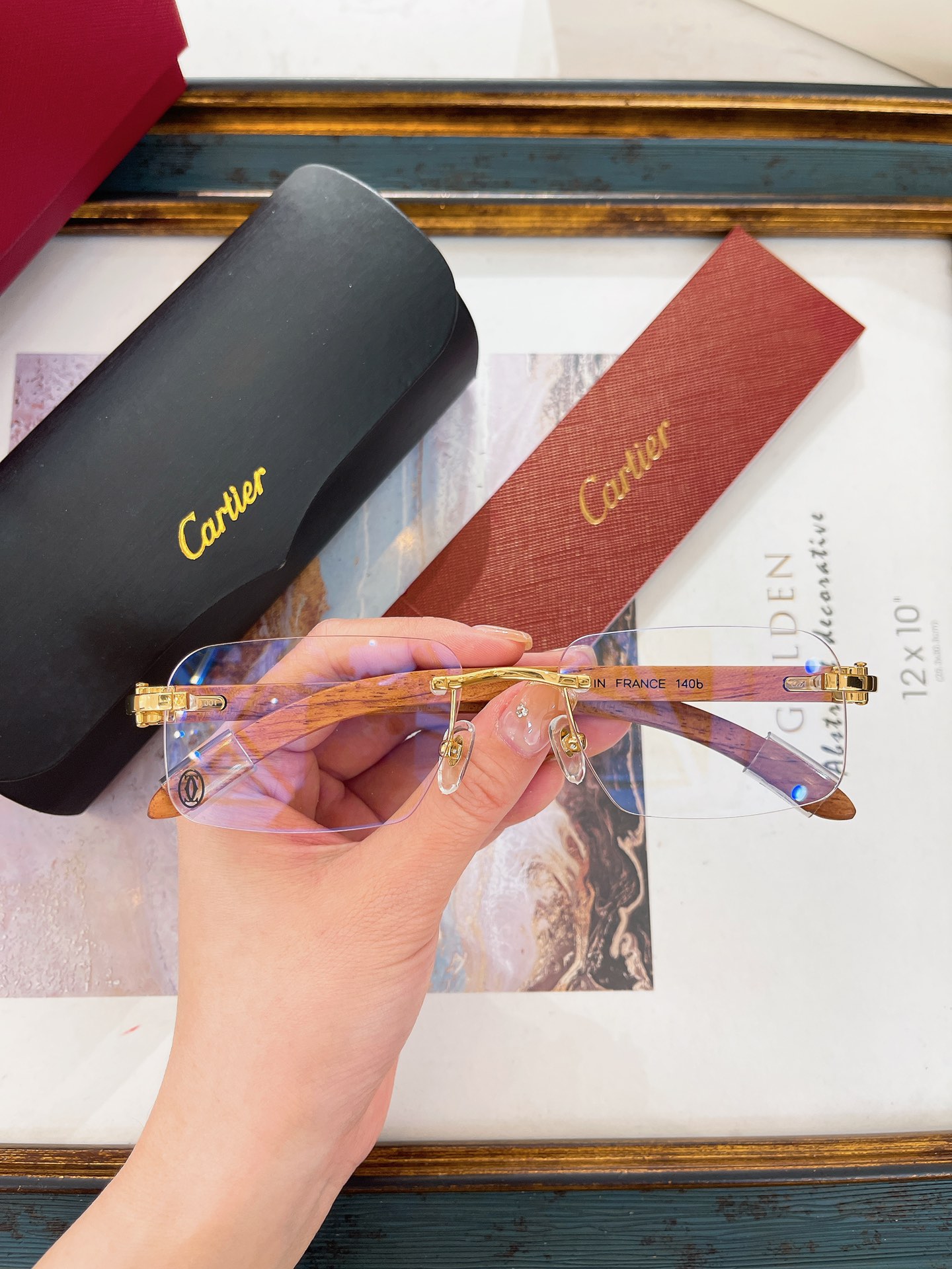 Cartier CT02420O Brushed Silver Wood-Temple Rimless Eyeglasses