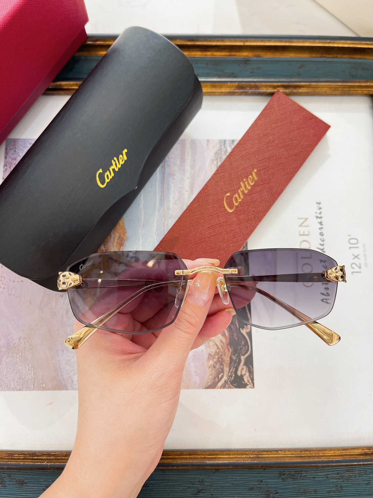 Cartier CT0583S Panther-Head Rimless Sunglasses